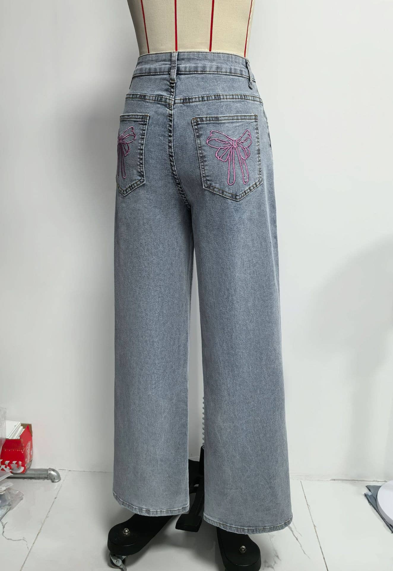 Blue Women High-Waisted Wide-Leg Jeans with Pink Bow Embroidery for wholesale on Faire8