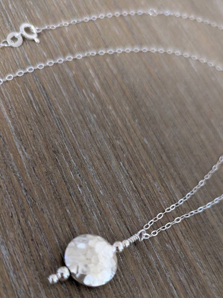 Hammered Circle Pendant Necklace for wholesale by North Fork Jewelry Design, LLC