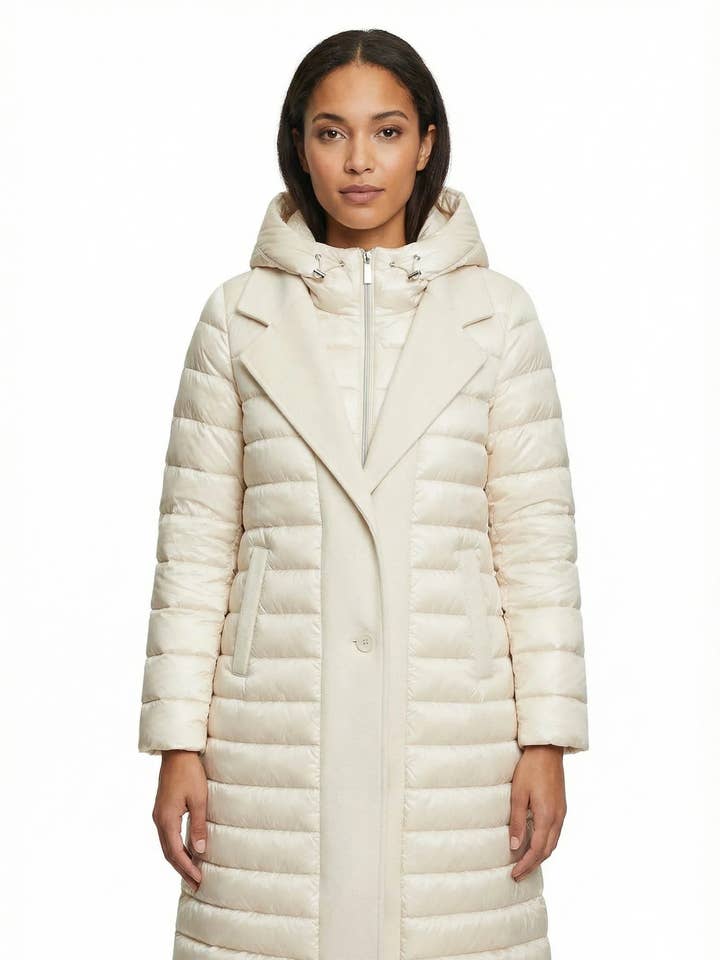 Lang dunjakke med skræddersyet krave og hætte i størrelserne S-M-L-XL-XXL for engroshandel hos L'Emotion