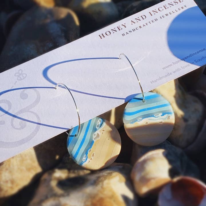 Sydhavsøernes øreringe for engroshandel hos Honey and Incense