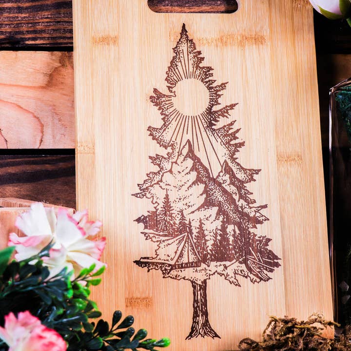 Tree with Mountain Scene Engraved Bamboo Cutting Board for wholesale by Rustic Cedar Co