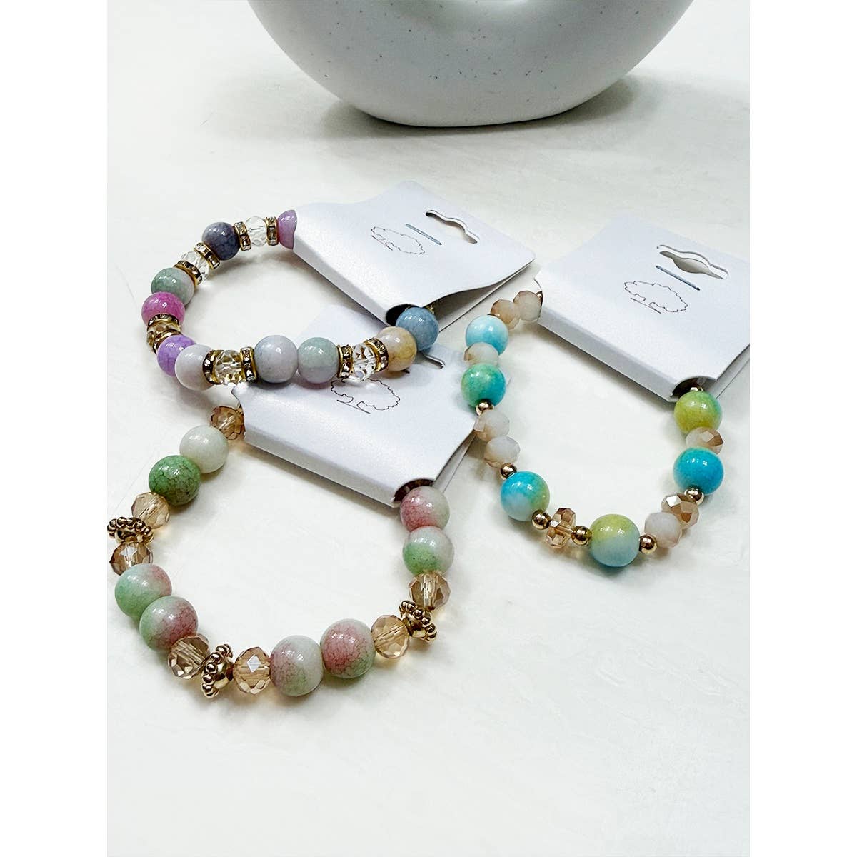 MÉLANGER LA COULEUR Bracelets extensibles en perles mélangées aux teintes douces en vente sur Faire4