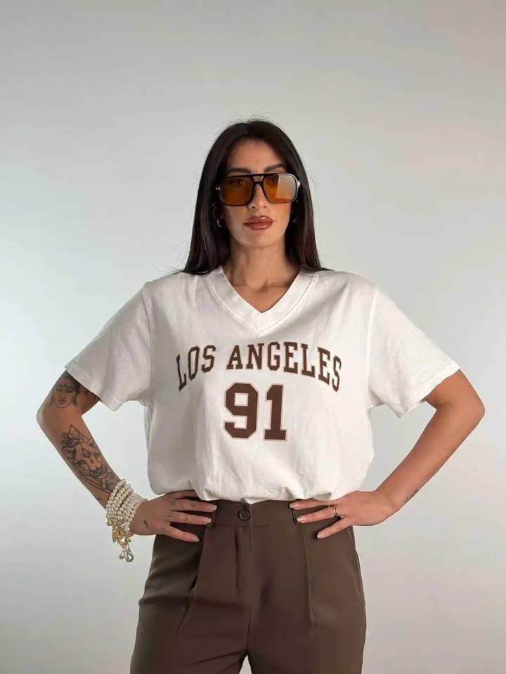 Blanc T-shirt oversize à col en V Los Angeles en vente sur Faire5