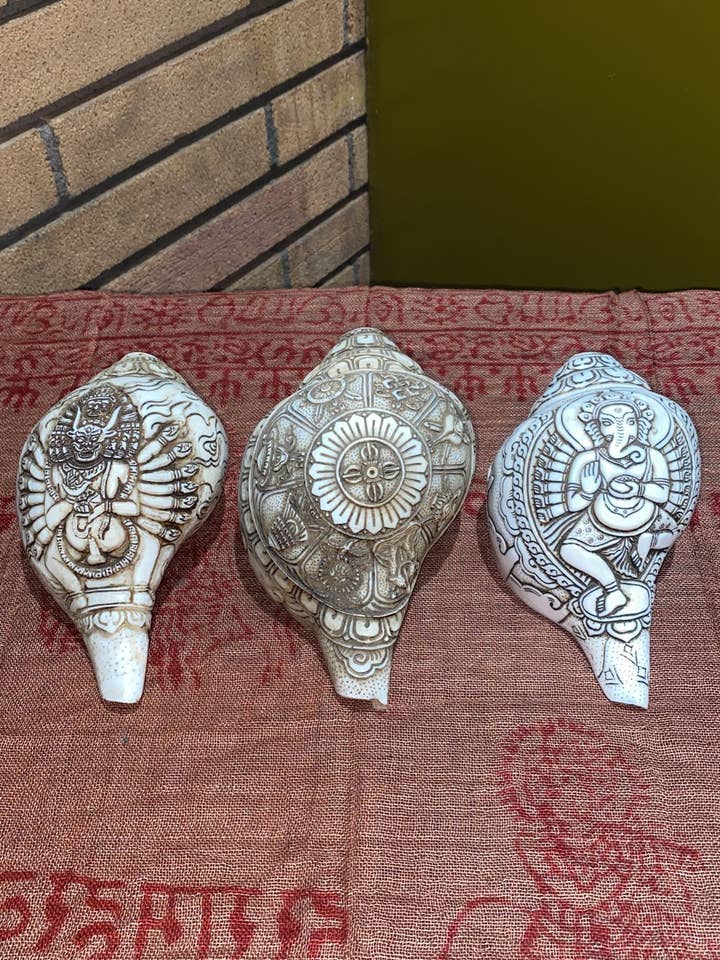 Hand-Carved Conch Sankha Shell Assorted Iconography (L) for wholesale by Katmandu Trading Co.