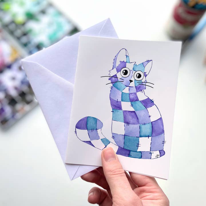 Cartão de Felicitações em Aquarela com Gato – Felino Aconchegante em Patchwork e outras tendências em Compre colchas para direto B2B. Devoluções gratuitas e condições de pagamento a 60 dias na Faire na Faire.