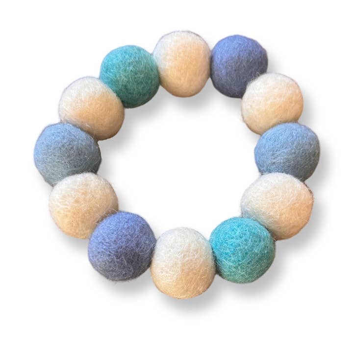 Pom Pom Bracelet - Cornish Blues / Baby Blues for wholesale by Puppies & Pom Poms