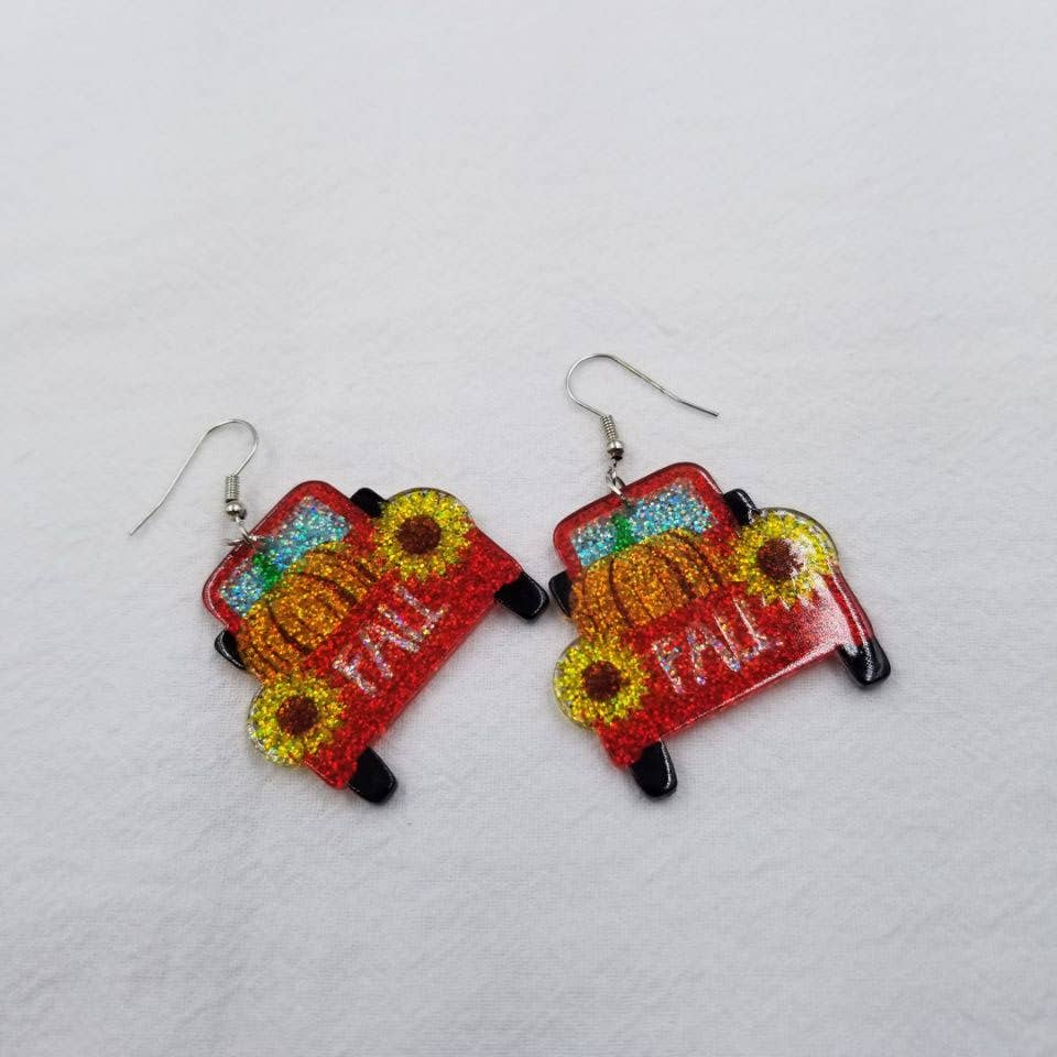 ENA Jewelry - Vente Boucles d'oreilles pendantes - Boucles d'oreilles Pumpkin Car en acrylique à paillettes1