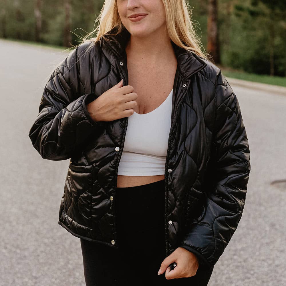Zwart Zwart gewatteerd PUFFERjack met knoopsluiting voor groothandel op Faire1