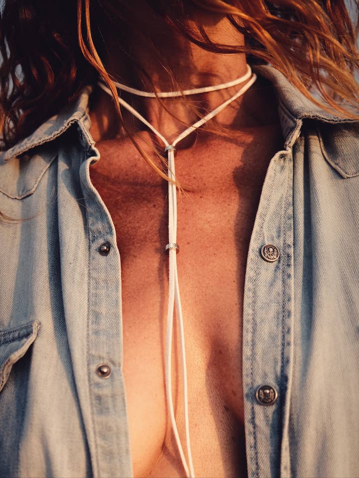 Vegan leather Snow Link, punctuated with silver stainless steel beads. Pure, discreet, minimalist. for wholesale by NO COMMENT