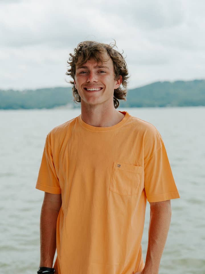 WaveWashed Ultra Soft Faded Orange Pocket T-Shirt for wholesale by Fulton Apparel Company