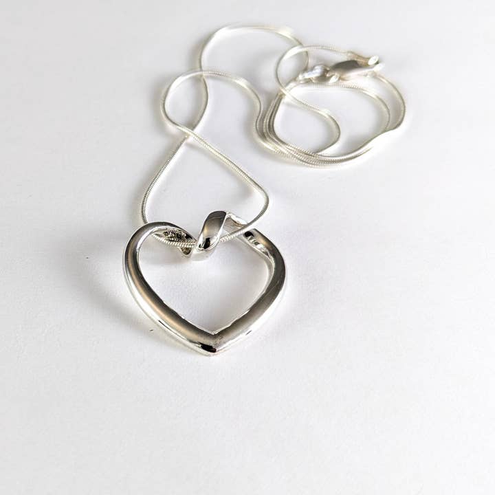 Looped Heart Pendant in Sterling Silver for wholesale by The Green Gecko