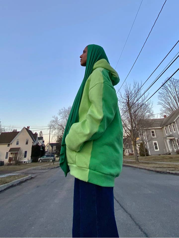 Sweat à capuche Gemini Split pour la vente par RE—INC