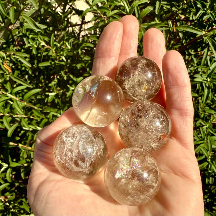 Liv Rocks - Wholesale Spiritual Stone/Crystal - Rainbow Smoky Quartz Spheres w/ Holder | Mini Crystal Ball