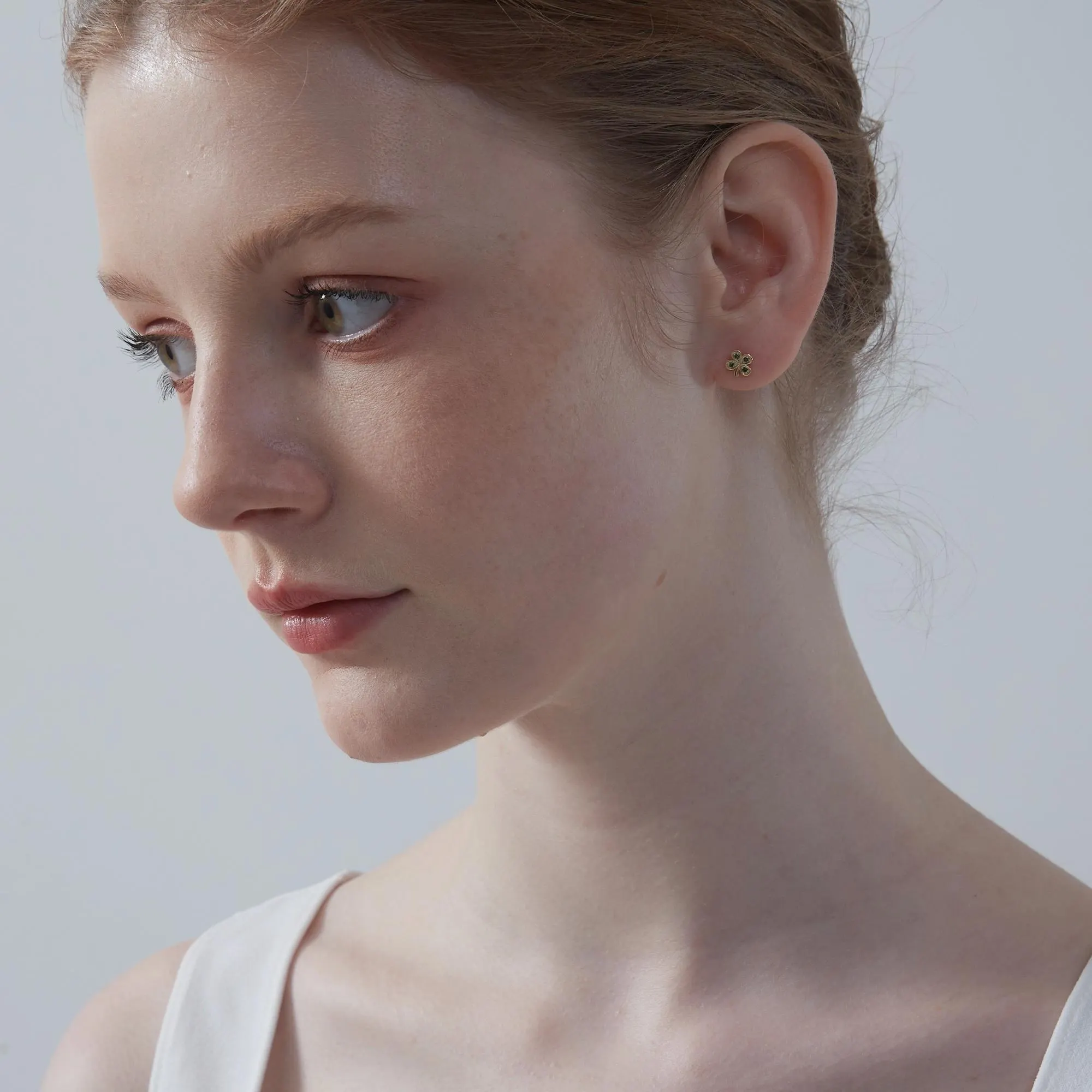 Perimade & Co. LLC – wholesale Stud/post earrings – Tiny Four Leaf Clover Stud Earrings in 925 Sterling Silver1