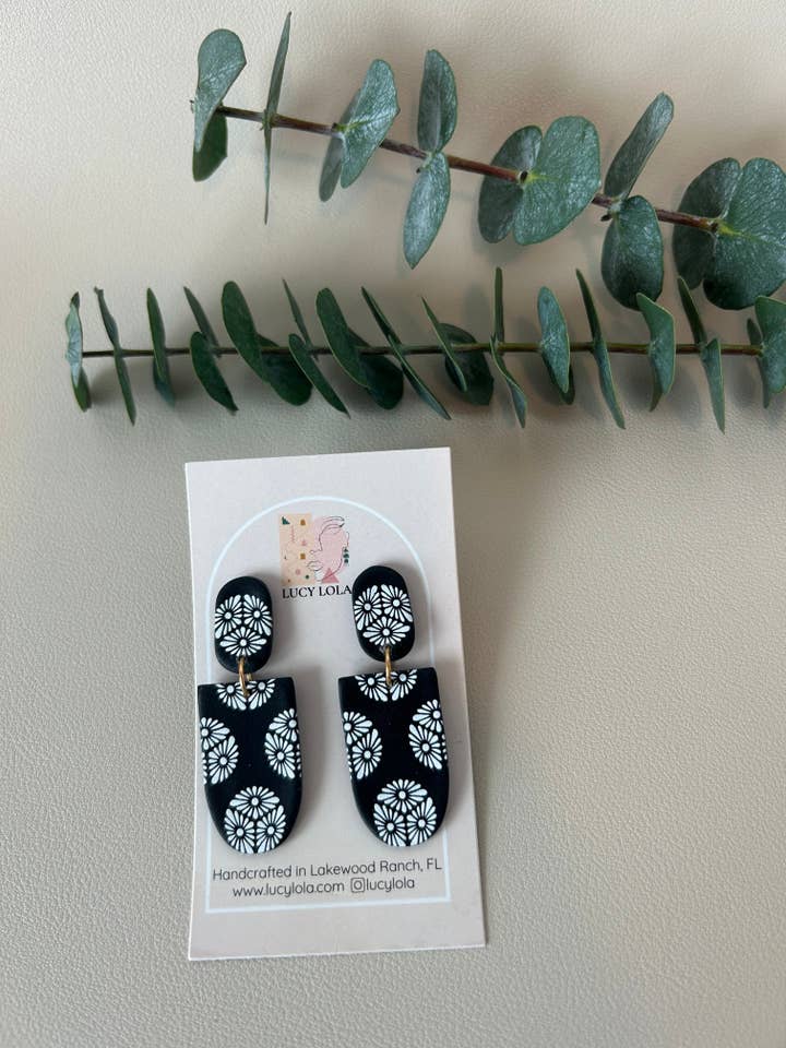 The Olivia - Daisy Print - White on Black for wholesale by lucylola