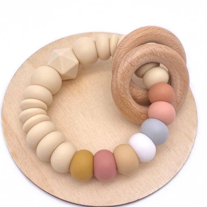 Soft Scandi Rainbow Rattle for wholesale by Kaity Kiddo