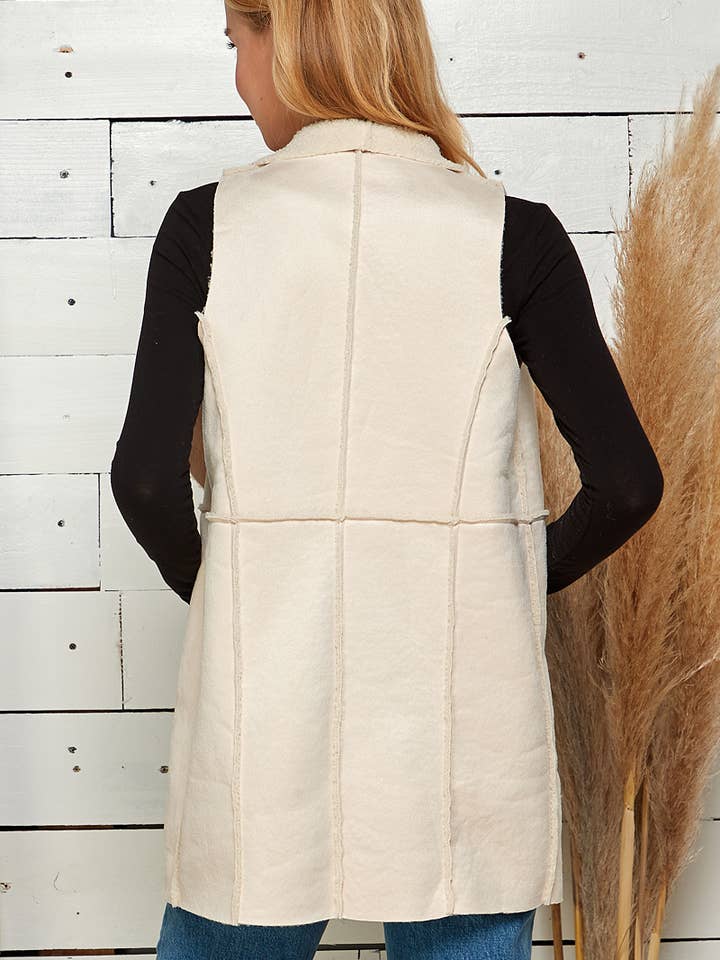 IVORY BOUCLE MUSTANG DRAPED COLLAR VEST for wholesale on Faire