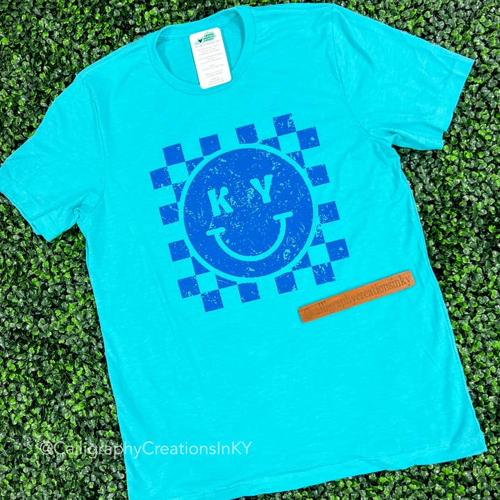 Teal Check Kentucky Tee for wholesale by Calligraphy Creations In KY