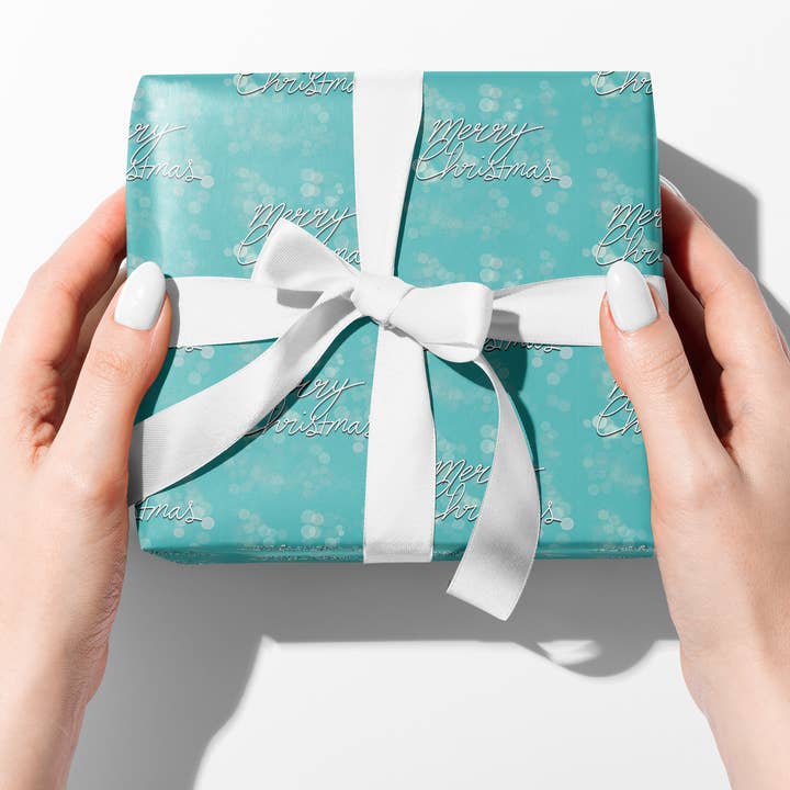 Luxus-Geschenkpapier mit blaugrünem Merry Christmas-Schriftzug für den Großhandel von FNIC designs