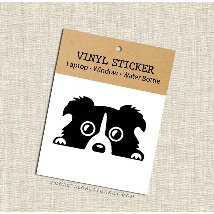 Peeking Dog Vinyl Laptop Sticker (Black, Packaged) for wholesale by Coastal Creators of Connecticut