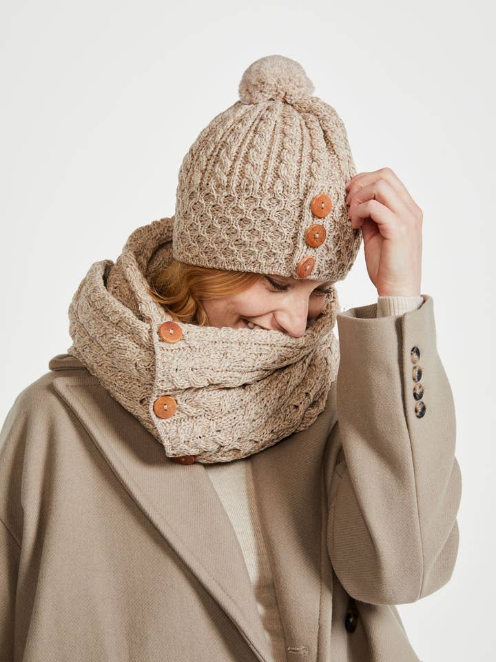 Shrule Aran Hat with Pom Pom - Oat for wholesale by Aran Woollen Mills