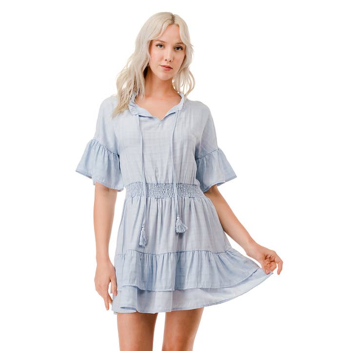 MINI-ROBE À VOLANTS ORNÉE DE POMPONS pour la vente par Mapcie