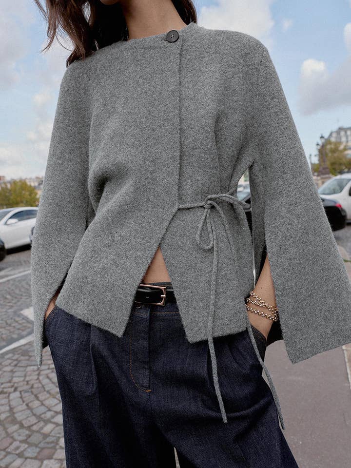 Giacca mantella asimmetrica con nodo frontale per la vendita all'ingrosso da parte di Mccolin