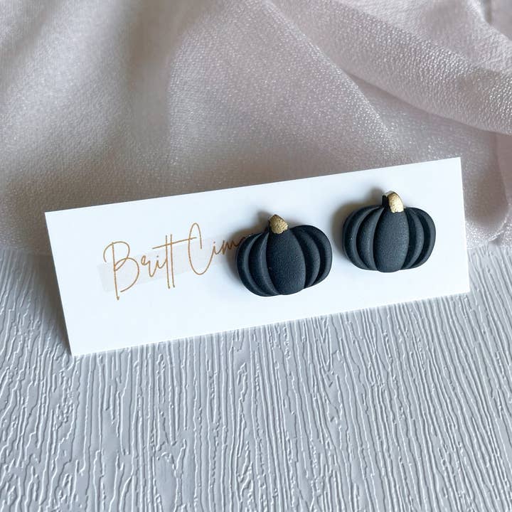 Black Pumpkin Polymer Clay Stud Earrings | Handmade for wholesale by Britt Cimone