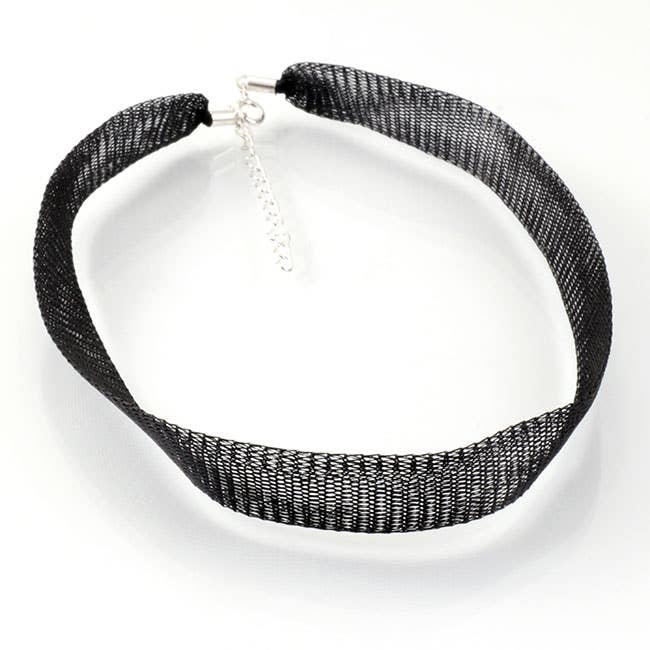 Titanhalsband med silver för wholesale av El Expreso de Oriente