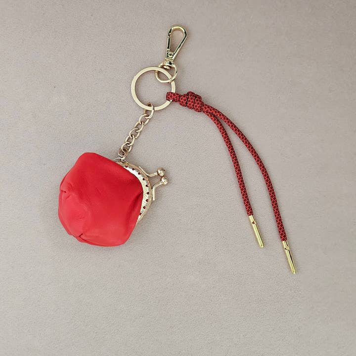 Bag charm, leather coin purse for wholesale by Royal marais