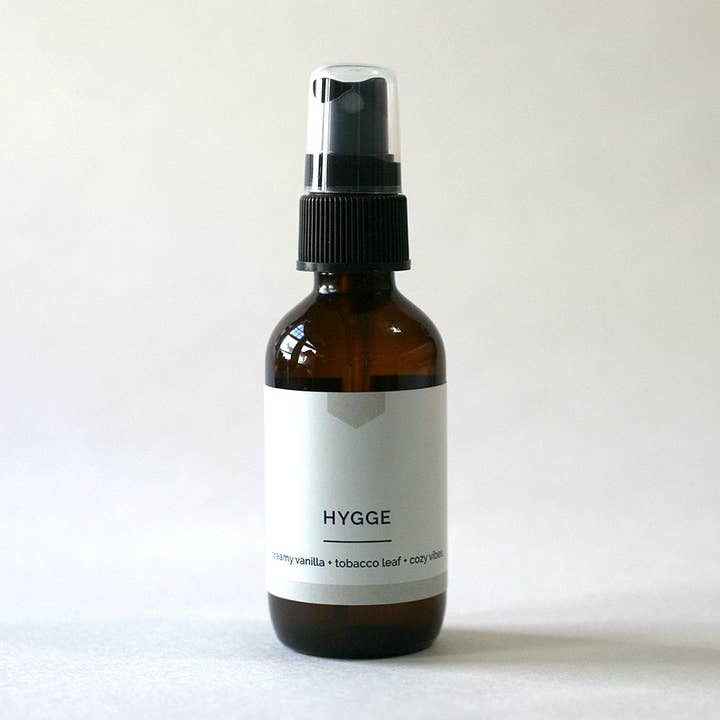 HYGGE Room and Linen Spray – Cozy Vanilla + Tobacco, Hand-Poured (2 oz) for wholesale by Vacant Wheel