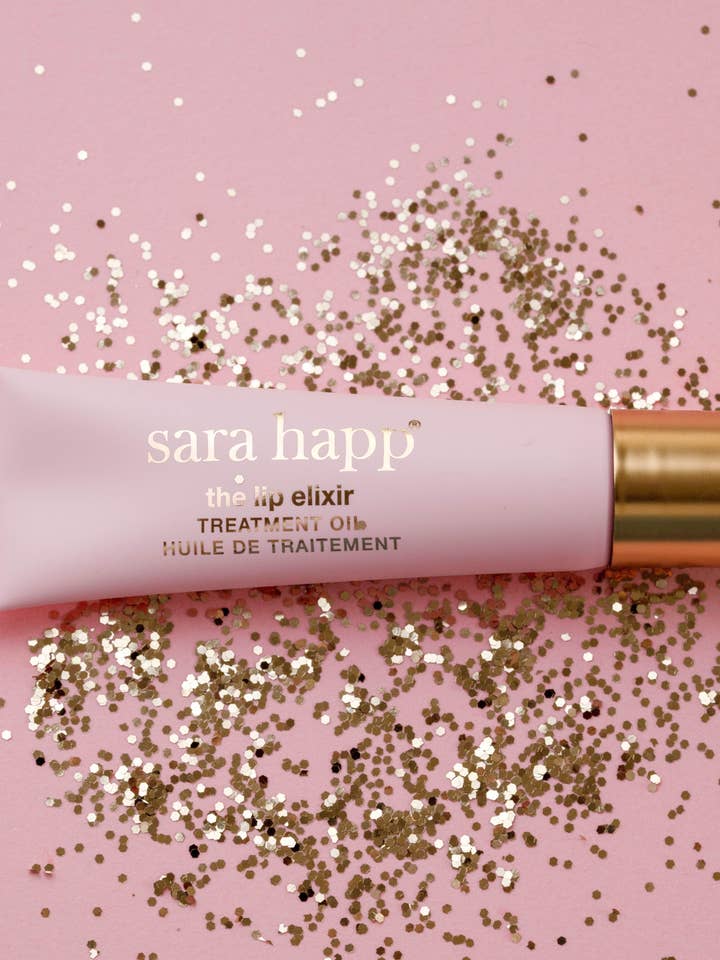 The Lip Elixir - Treatment Oil with Rose Quartz Rollerball for wholesale by Sara Happ