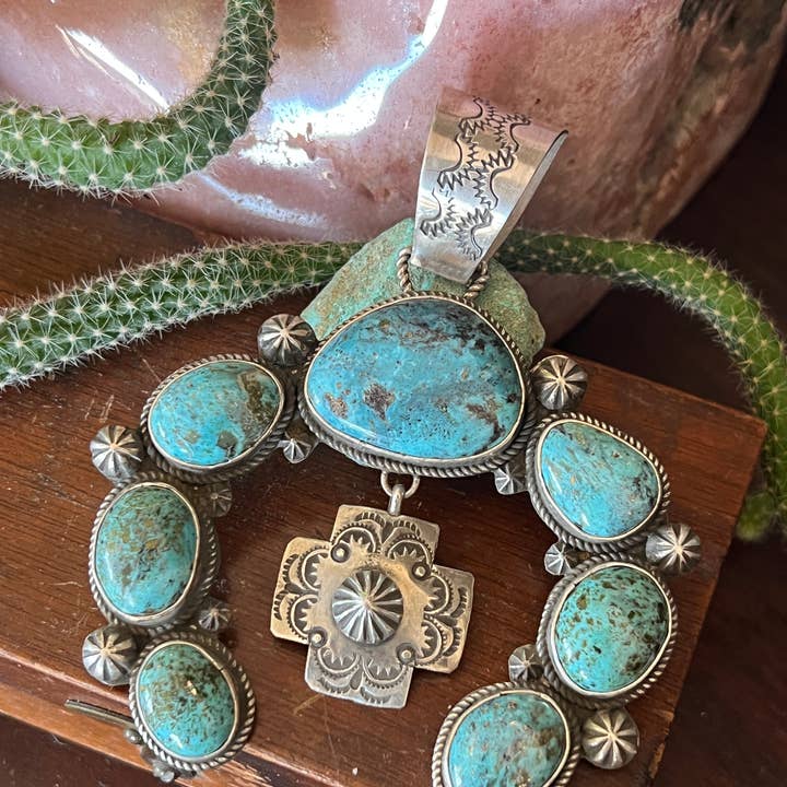 Apache Made Sterling Silver and Egyptian Turquoise Naja Pendant by Rosella Paxson and other Purchase Wholesale apache. Free Returns & Net 60 Terms on Faire trending on Faire.
