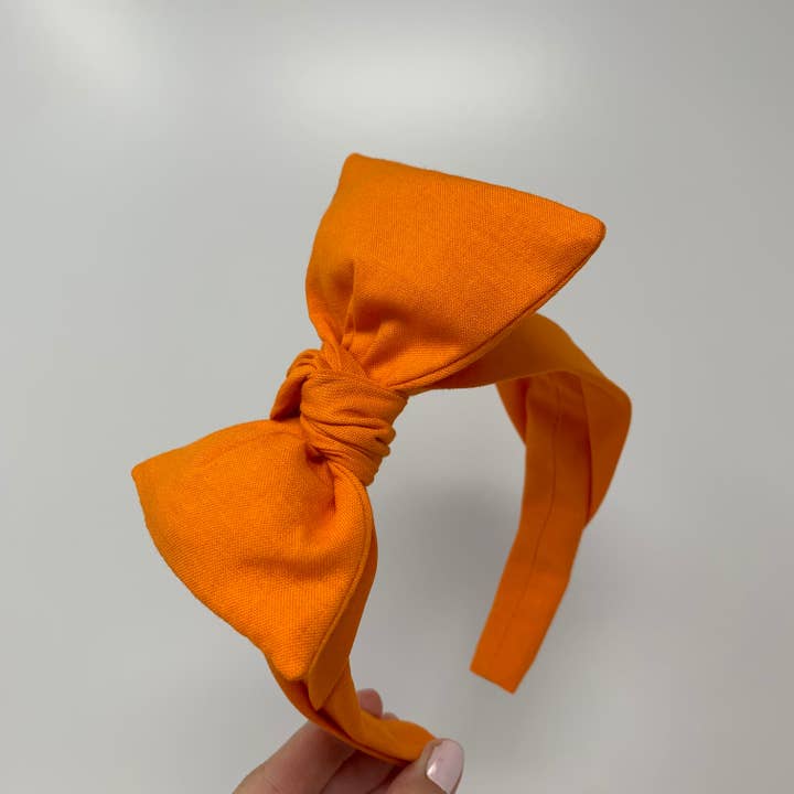 BellaBow XL arancione solido per la vendita all'ingrosso da parte di Bella Notte & Co