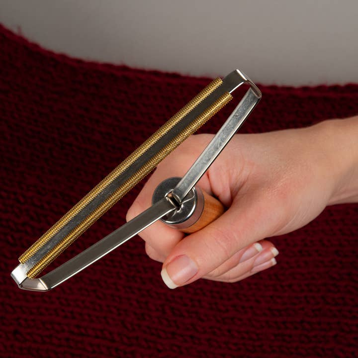 O DESCASCADOR - REMOVEDOR DE COTÃO por atacado de Sting in the Tail Ltd