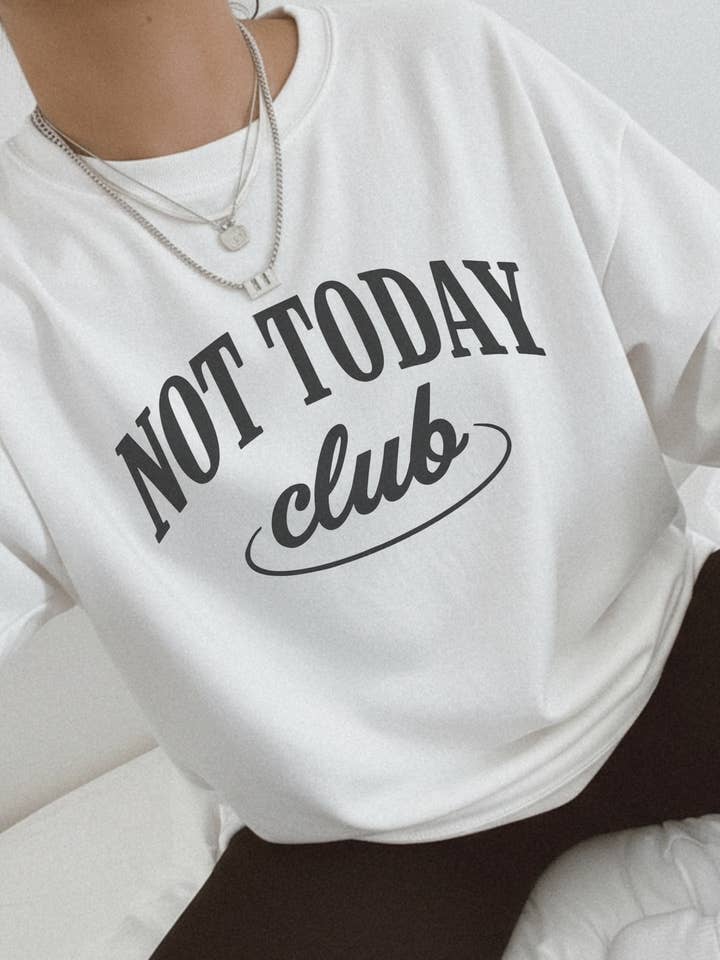 Not Today Club Graphic Sweatshirt and other Purchase Wholesale not today. Free Returns & Net 60 Terms on Faire trending on Faire.