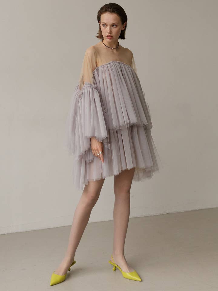 Grå tyl oversize gallakjole for engroshandel hos Lutien Bridal