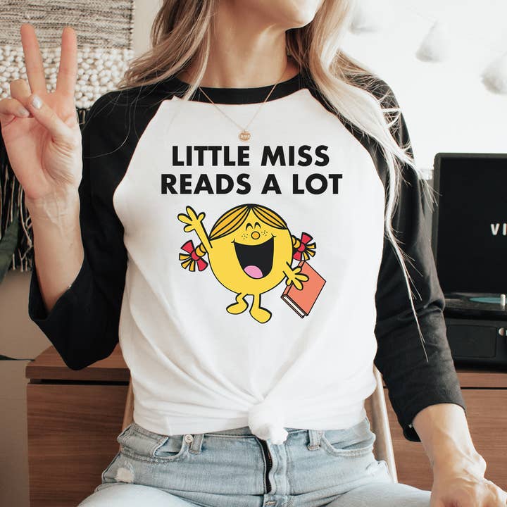 Little Miss Reads A Lot 3/4 Sleeve Raglan T-shirt for wholesale by Keen Bee Studio