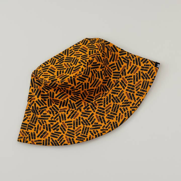 Brown Satin Lined Printed Bucket Hat in Umber for wholesale on Faire