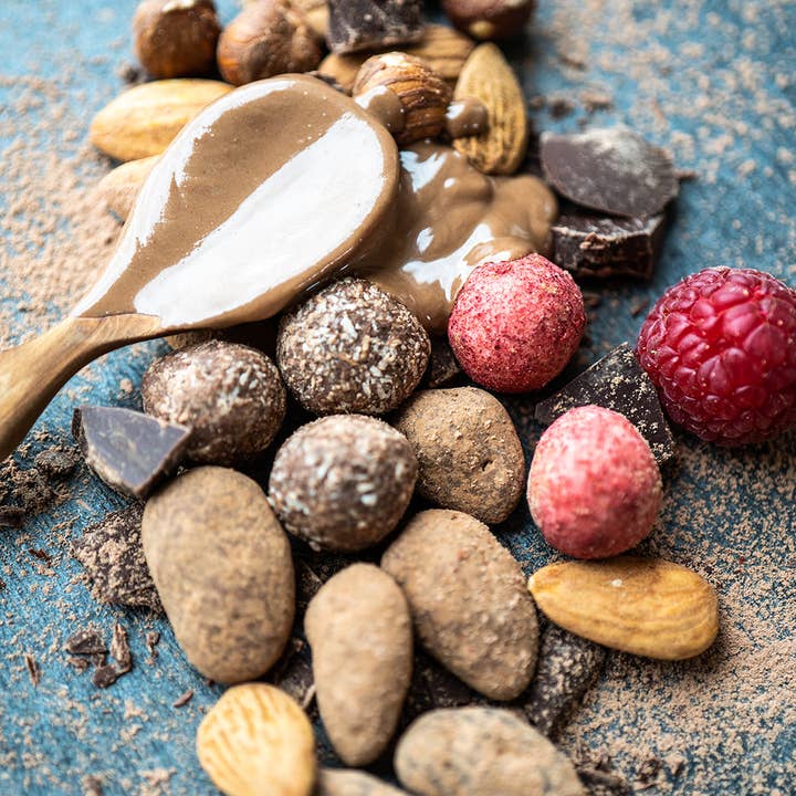 Happy Hours en Biovallée – Doces cobertos de chocolate por atacado – Saqueta Amêndoa Caramelo Chocolate Bio Max Havelaar -115g-Páscoa2