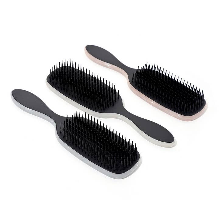 NEW HANDLE MASSAGE SCALP HAIR SMOOTHING COMB_CWAHA1869 and other Purchase Wholesale scalp combs. Free Returns & Net 60 Terms on Faire trending on Faire.
