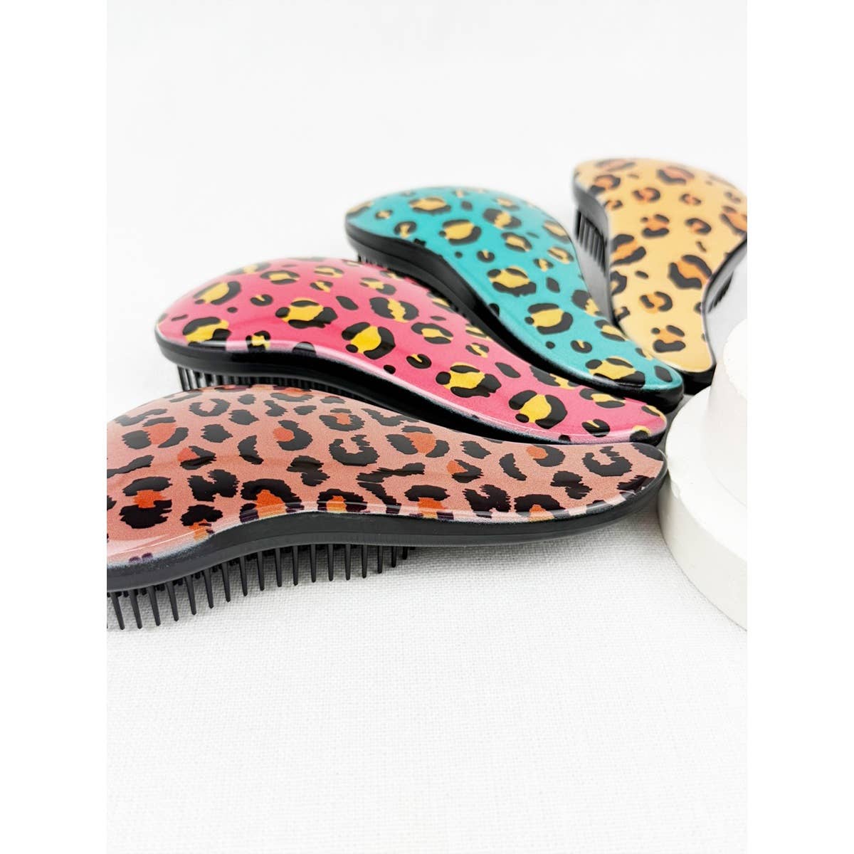 Glide on Easy Grip Leopard Print Hair Brush for wholesale on Faire7