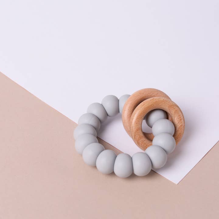 Dove Grey Silicone and Beechwood Teether for wholesale by Pops and Dudes