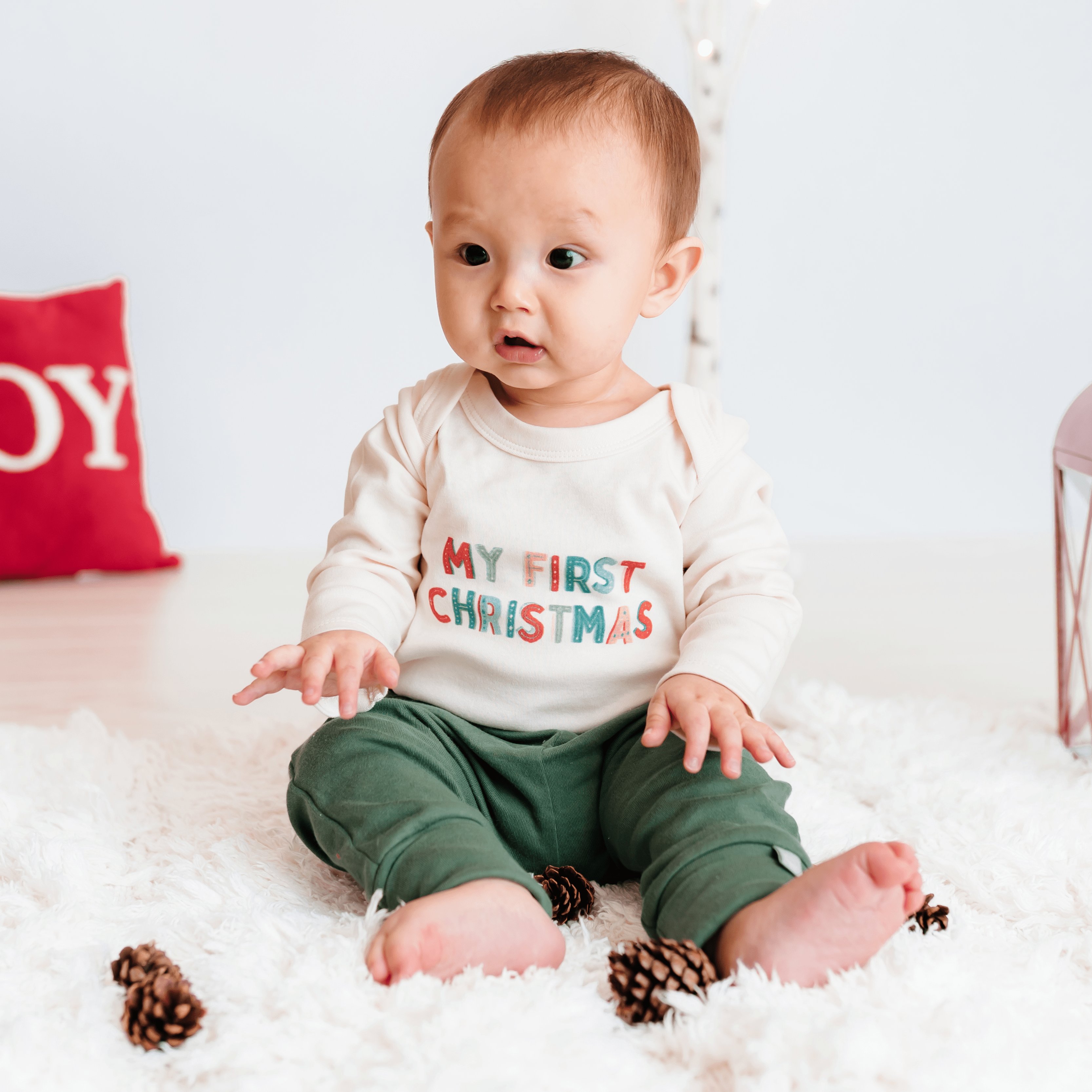 Default graphic baby onesie | my first christmas long sleeve organic for wholesale on Faire1