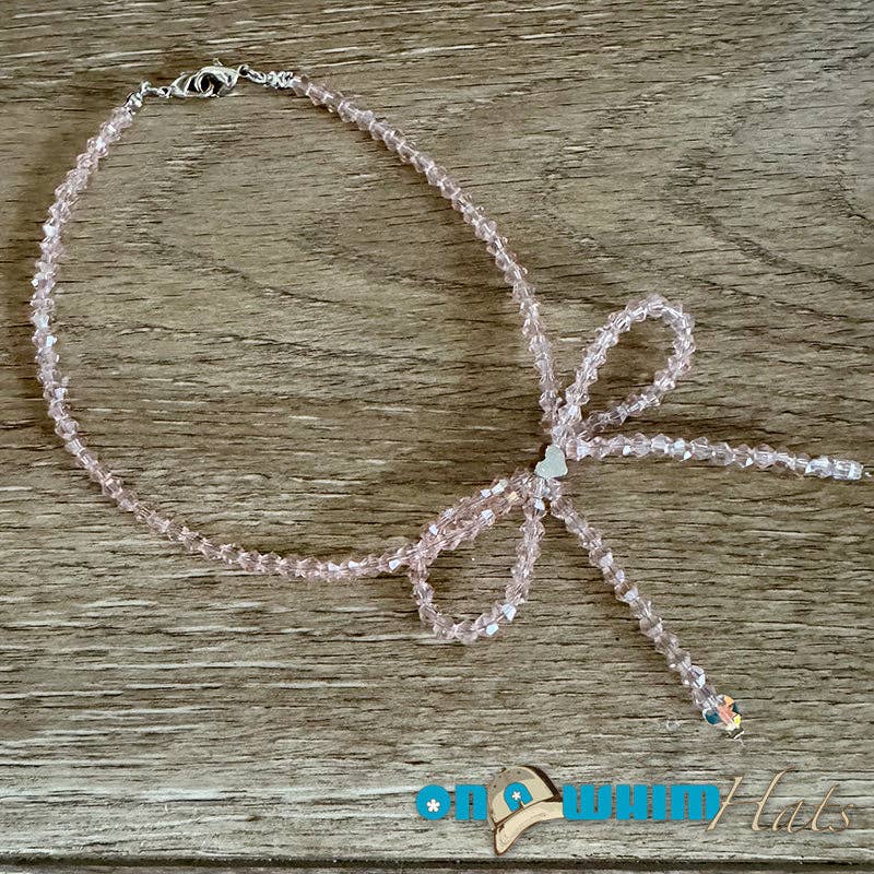 On a Whim Hats - Wholesale Hoedaccessoires - Dames - Lichtroze Strik Hoed Ketting0