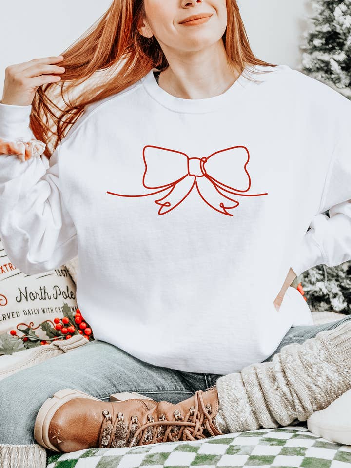 Minimal Christmas Bow | Comfort Colors Sweatshirt for wholesale by Rules of Positivity