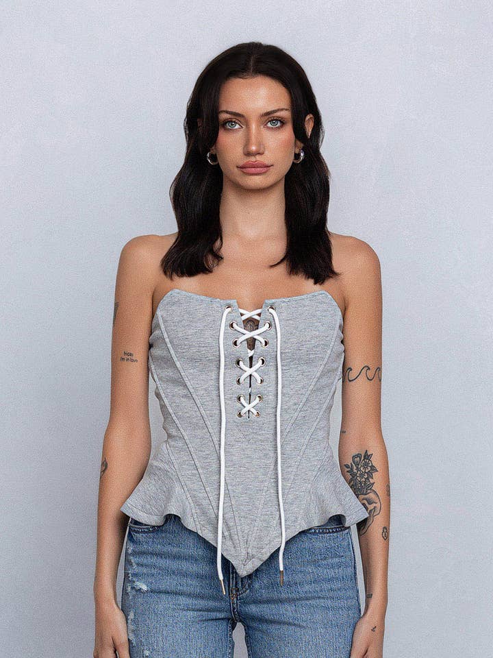 Heather Grey Jersey bustier top w/ boning and lace up details for wholesale on Faire0