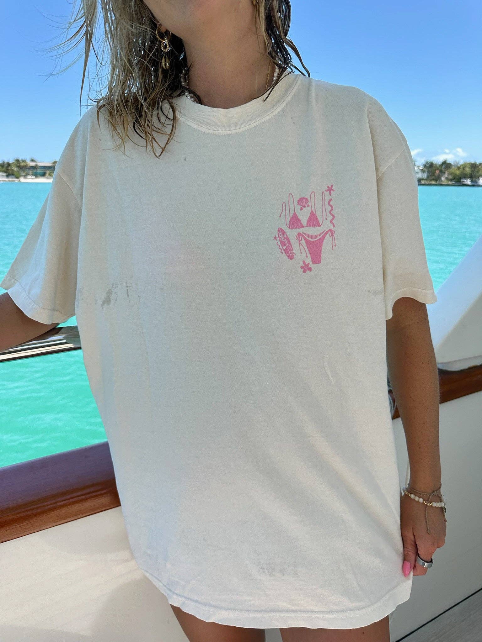Ivory Pink Swim And Surf Comfort Colors Tee for wholesale on Faire1