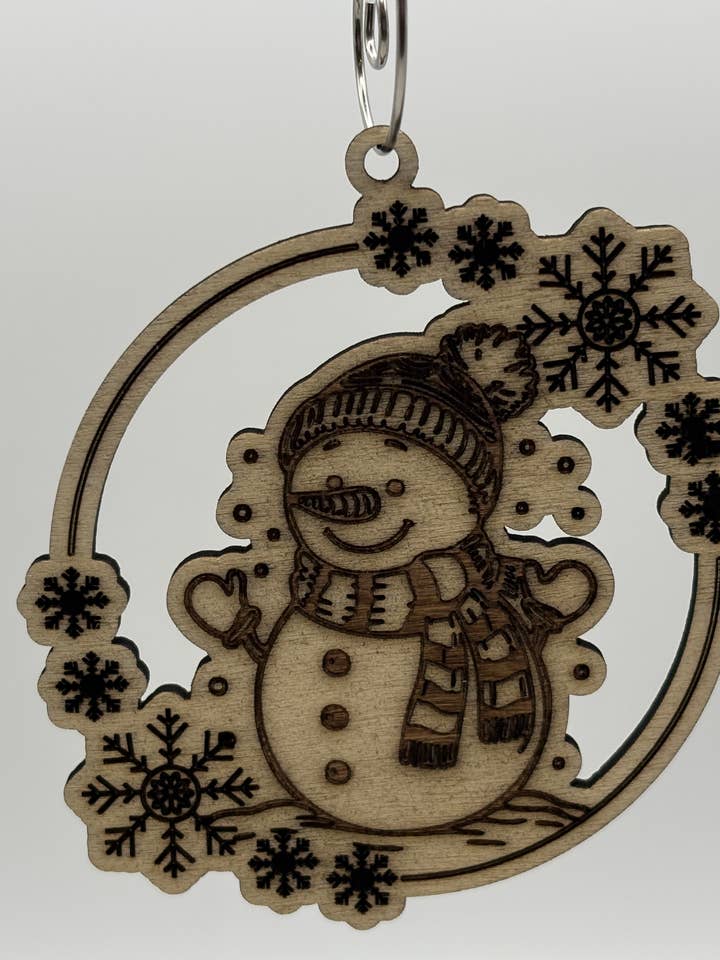 Snowman & Snowflakes Wood Ornament for wholesale by Chickadee Woods Designs, LLC