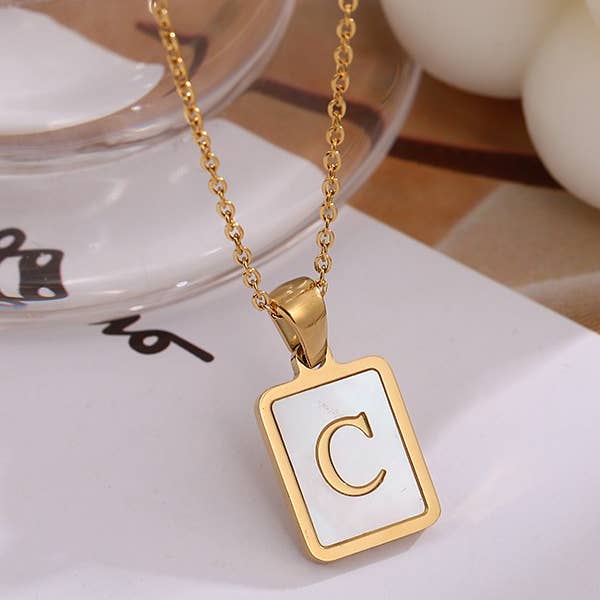 JOSSLYN by wall to wall - Wholesale Pendant/Charm Necklace - MOP INITIAL STAINLESS STEEL TARNISH FREE NECKLACE | 40NK31416